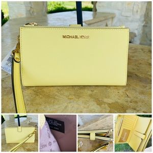 Michael Kors double zip leather wallet buttercup